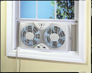 4. Holmes Dual Blade Twin Window Fan